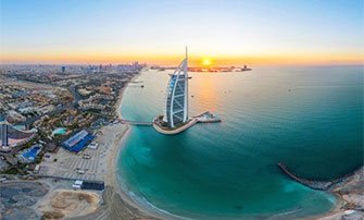 The Burj Al Arab and Dubai coastline at sunrise, a potential MSC Cruises destination | MSC Cruises