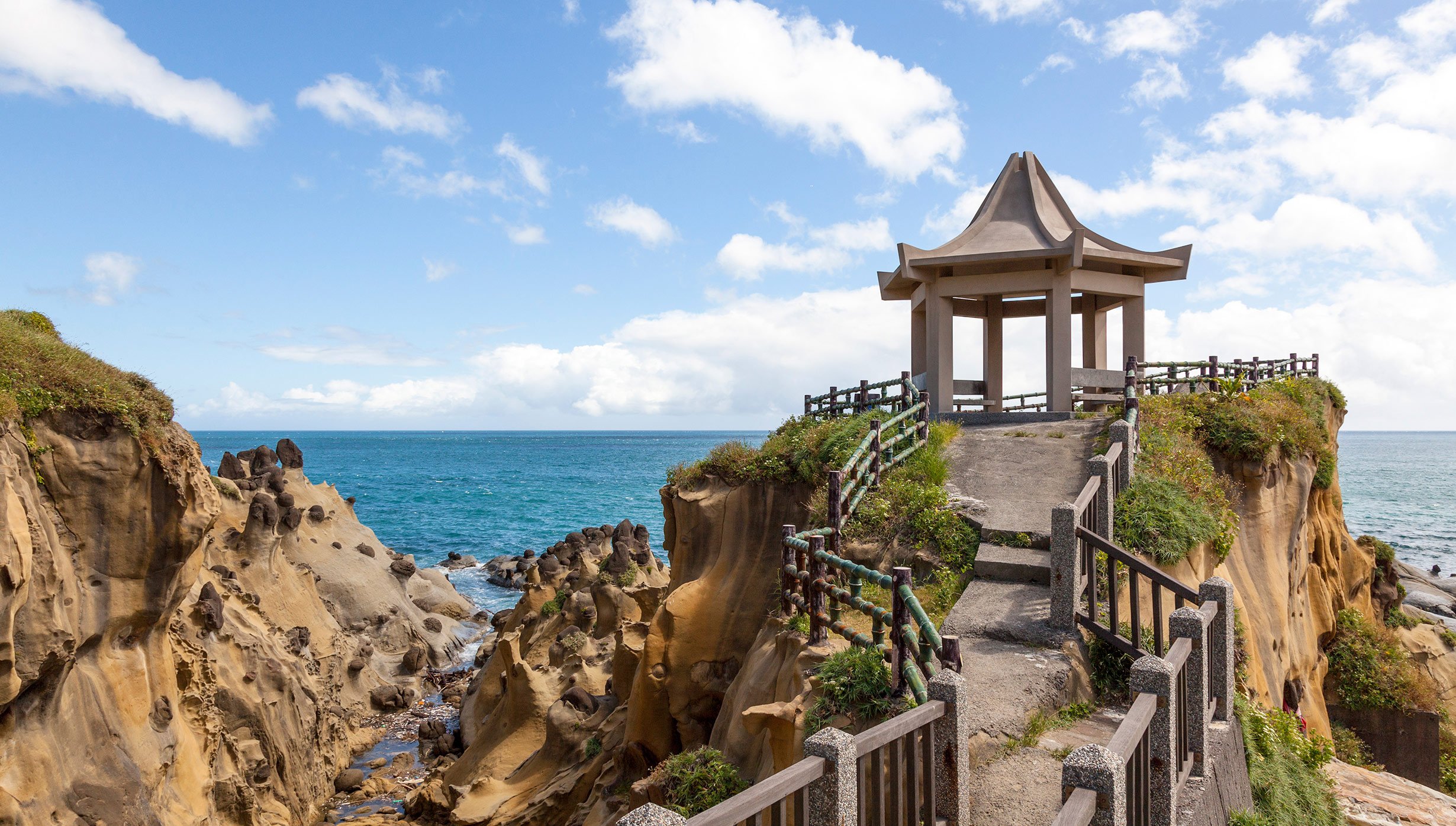 A scenic coastal pavilion overlooking the ocean on a sunny day | MSC Cruises A scenic coastal pavilion overlooking the ocean on a sunny day | MSC Cruises