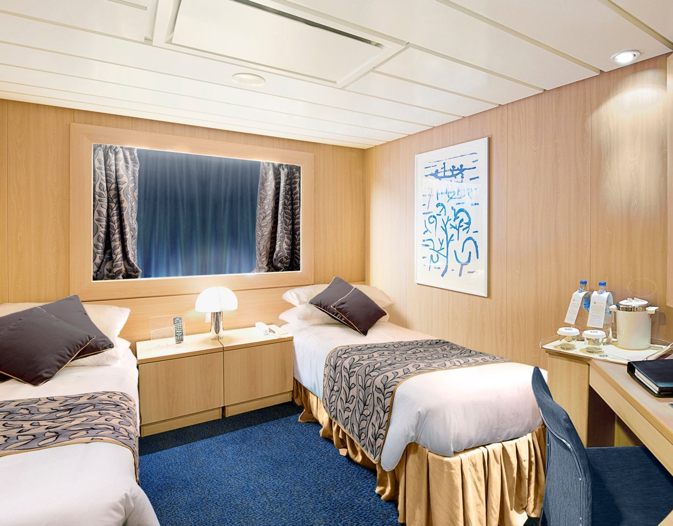 Interior cabin with twin beds, modern decor, and amenities on an MSC cruise ship | MSC Cruises Interior cabin with twin beds, modern decor, and amenities on an MSC cruise ship | MSC Cruises