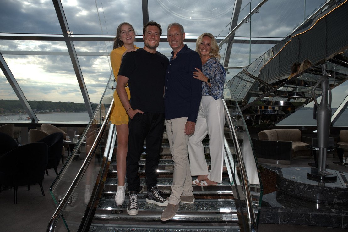 Elegant lounge with glass walls and scenic views onboard a cruise ship | MSC Cruises