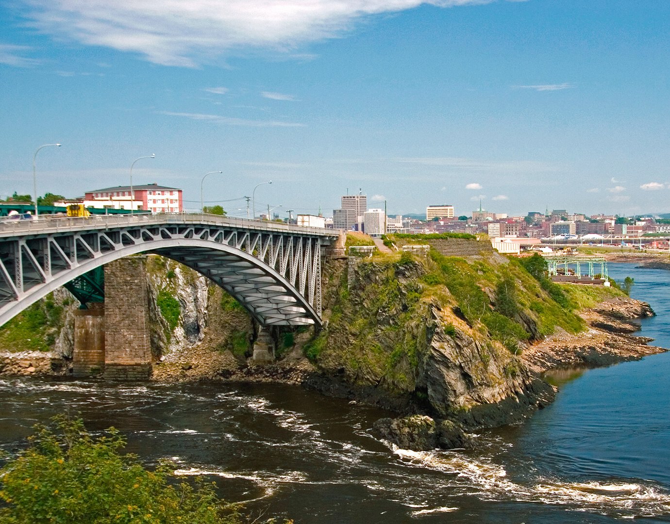 A scenic bridge overlooking cliffs and water in a coastal city | MSC Cruises
