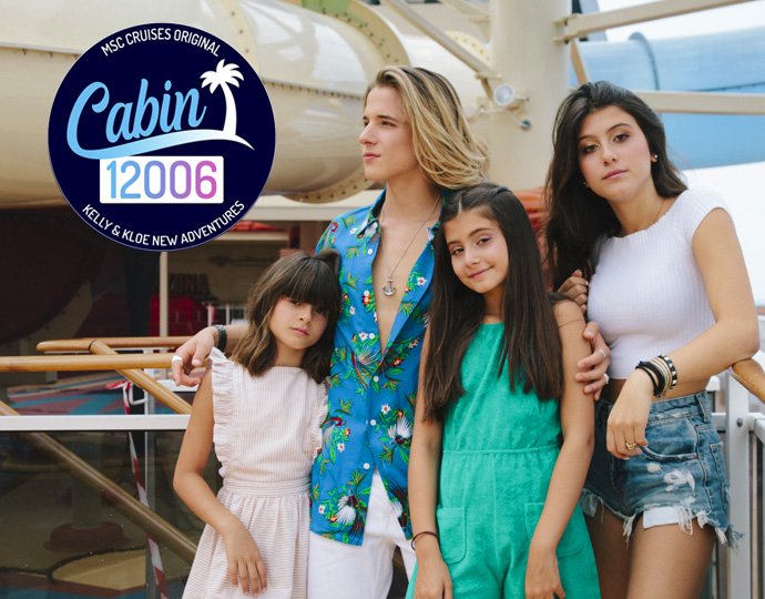 Family posing on a cruise ship deck near a waterslide, promoting Kelly & Kloe adventures | MSC Cruises